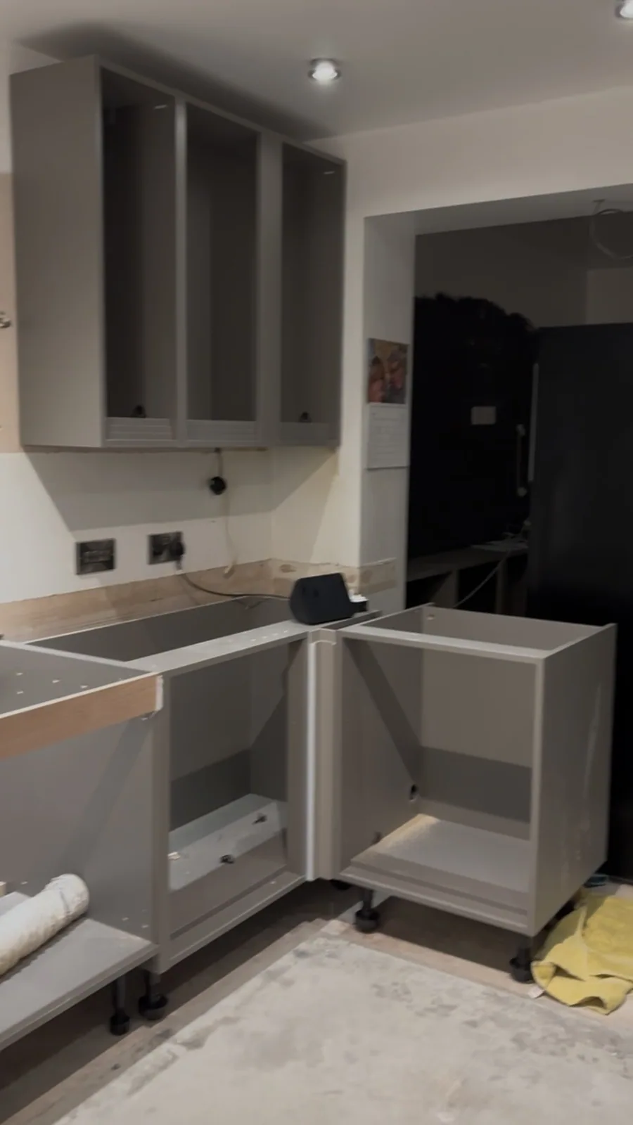 Kitchen cabinets being fitted